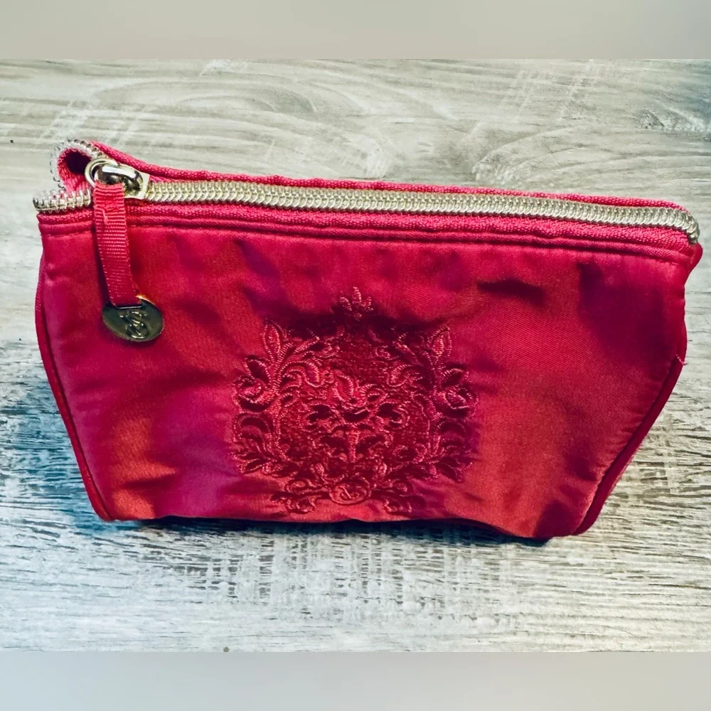 Victoria Secret Pink small satin cosmetic bag. With embroidered logo.